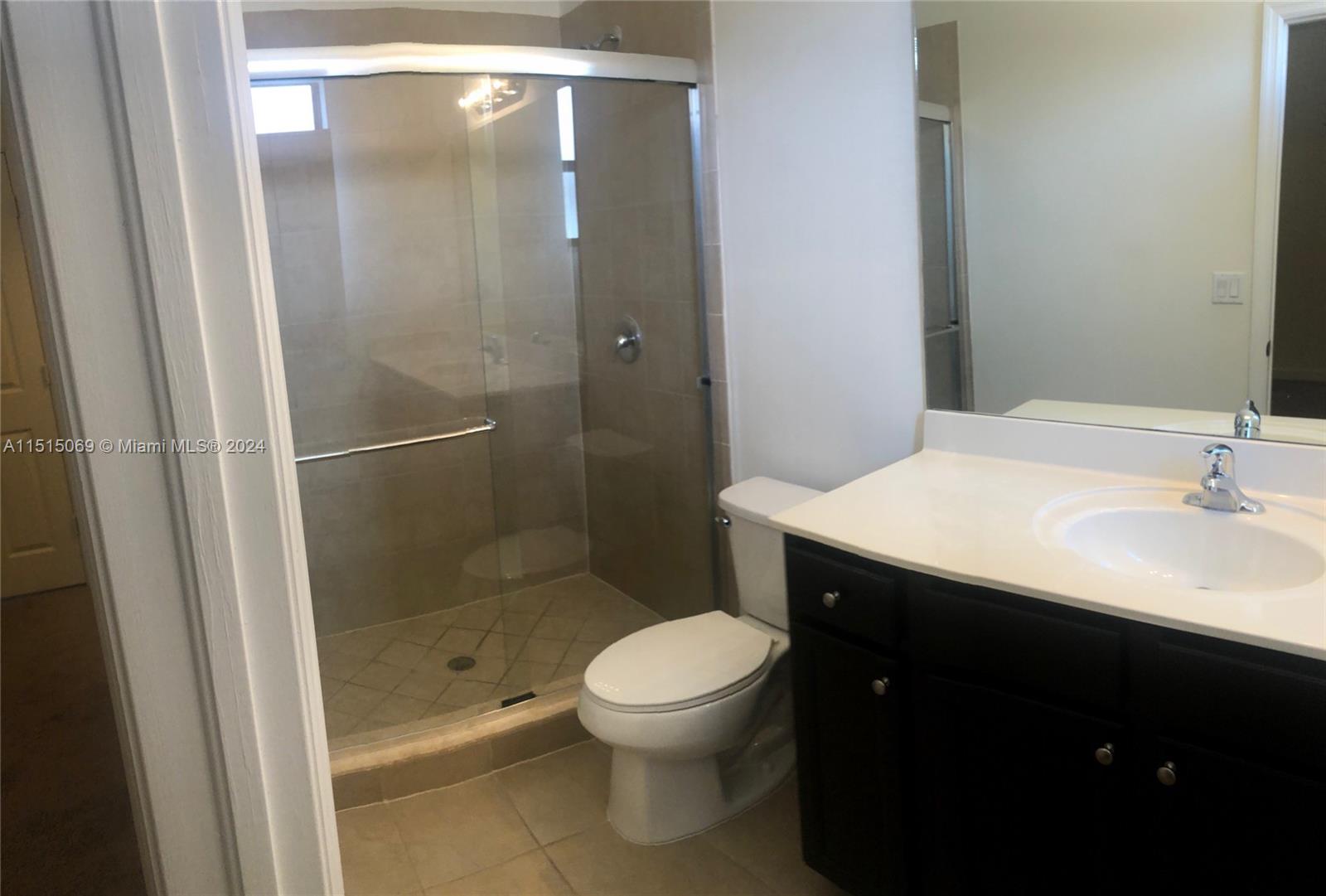15053 Southwest 115th Terrace Miami, FL 33196 - Photo 27 of 29 a bathroom with a sink toilet and shower