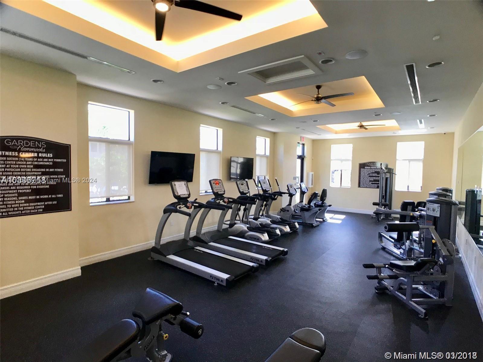 15053 Southwest 115th Terrace Miami, FL 33196 - Photo 5 of 29 a view of a room with gym equipment
