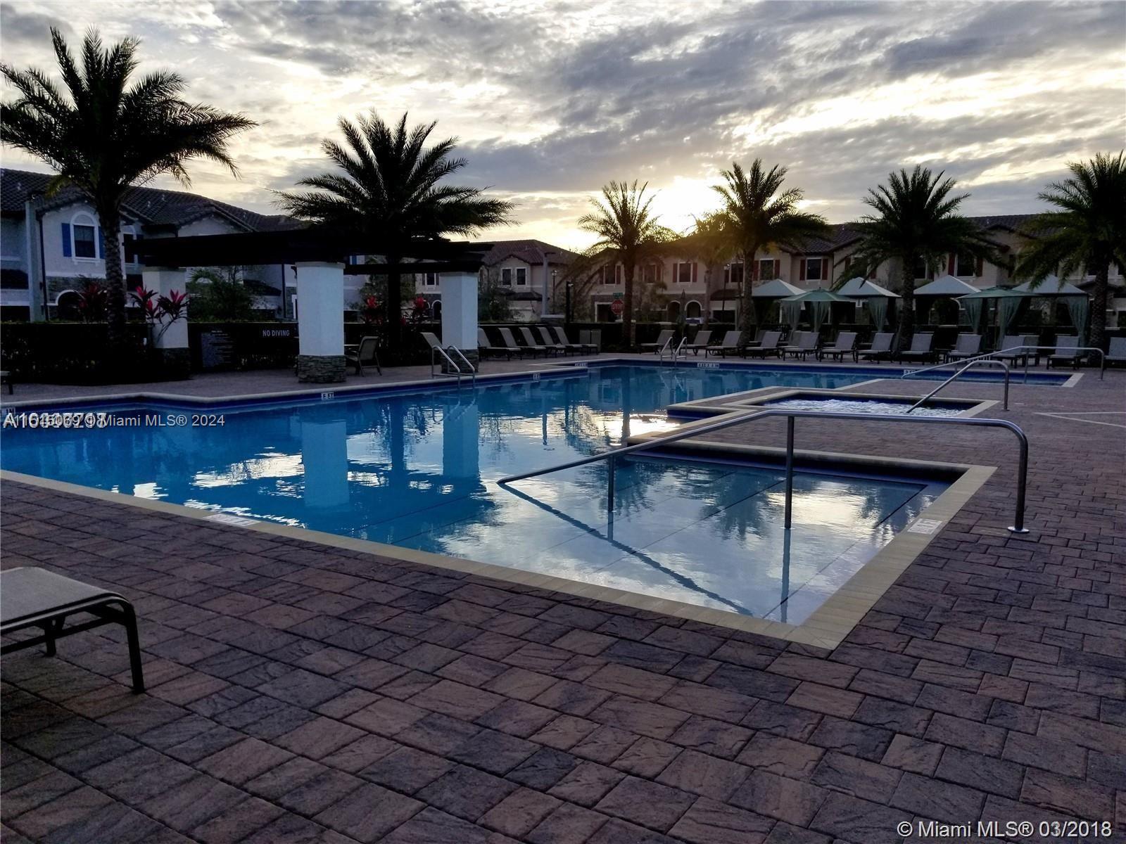 15053 Southwest 115th Terrace Miami, FL 33196 - Photo 10 of 29 a view of a swimming pool with a patio