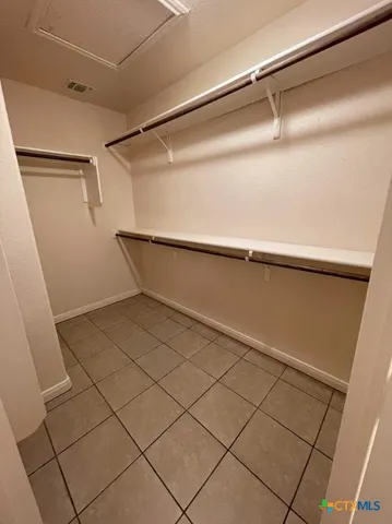 a view of a room with racks on the wall