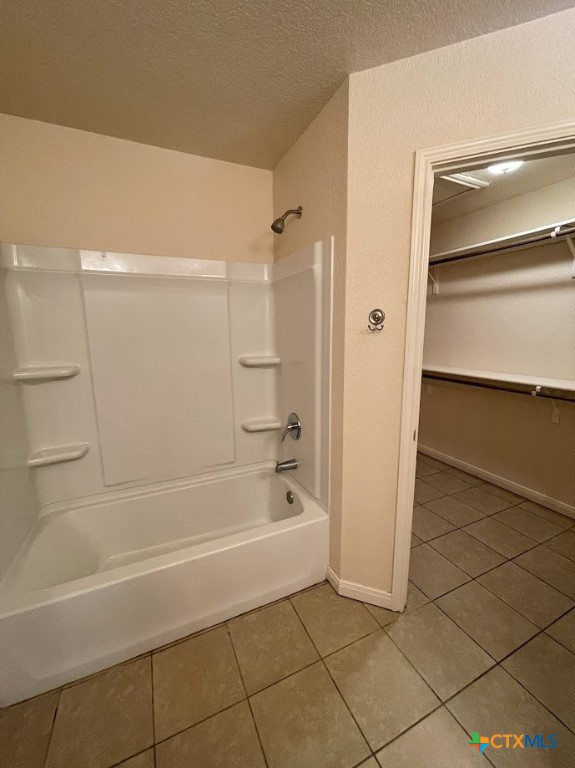 2455 Golf Drive Spring Branch, TX 78070 - Photo 23 of 24 a bathroom with a bathtub and a shower