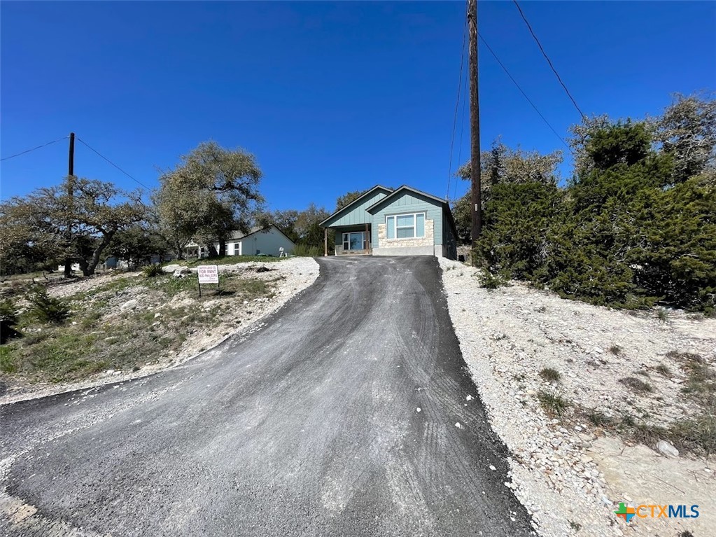 2455 Golf Drive Spring Branch, TX 78070 - Photo 6 of 24 a view of a backyard of the house