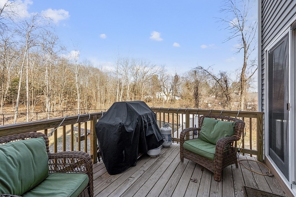 36 Pine Street Dudley, MA 01571 - Photo 19 of 26 a view of a chairs in the roof deck