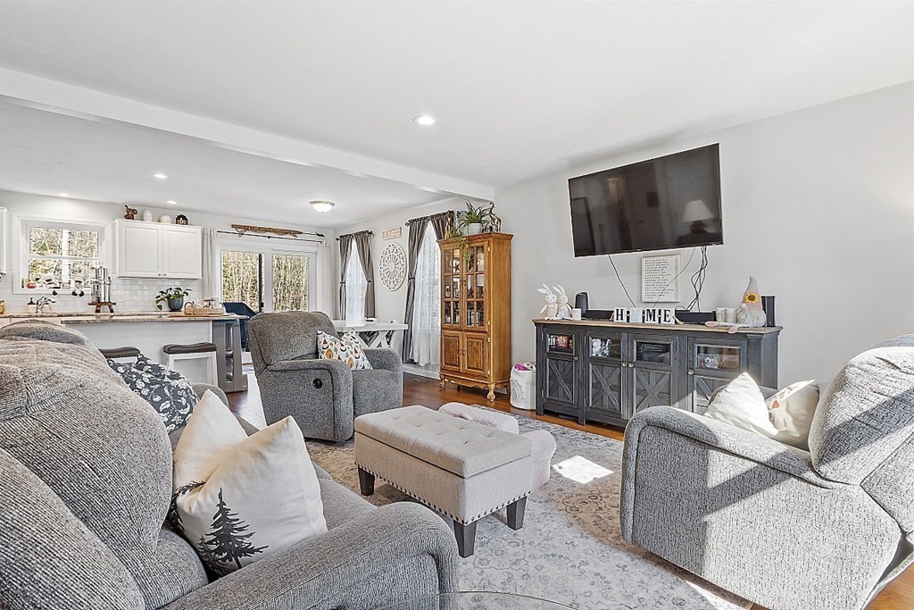 36 Pine Street Dudley, MA 01571 - Photo 2 of 26 a living room with furniture and a flat screen tv