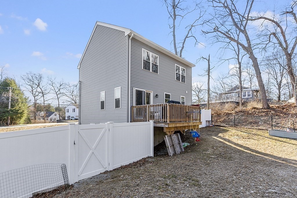 36 Pine Street Dudley, MA 01571 - Photo 21 of 26 a view of a house with a patio