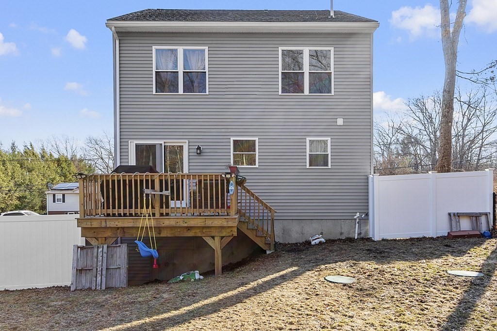 36 Pine Street Dudley, MA 01571 - Photo 22 of 26 a view of a house with a roof deck