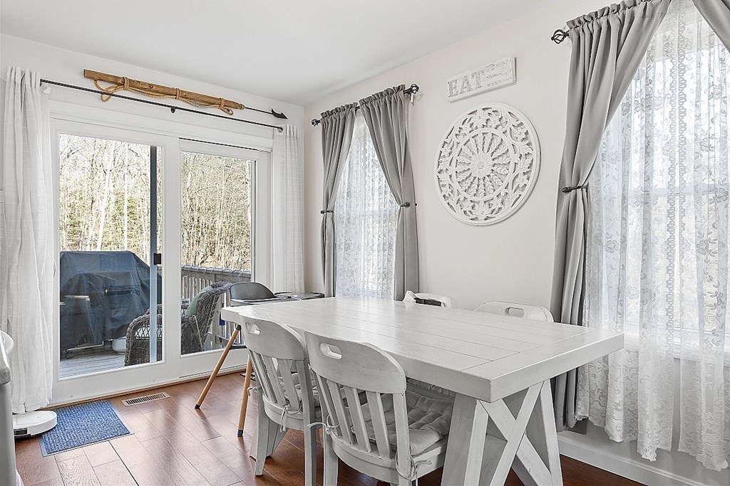 36 Pine Street Dudley, MA 01571 - Photo 6 of 26 a view of a dining room with furniture window and wooden floor
