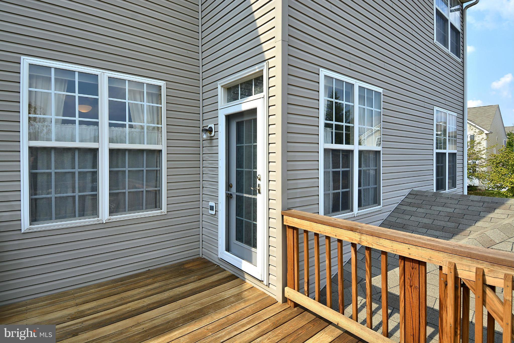 18133 Coachmans Road Germantown, MD 20874 - Photo 27 of 30 Deck with stairs to fenced yard!