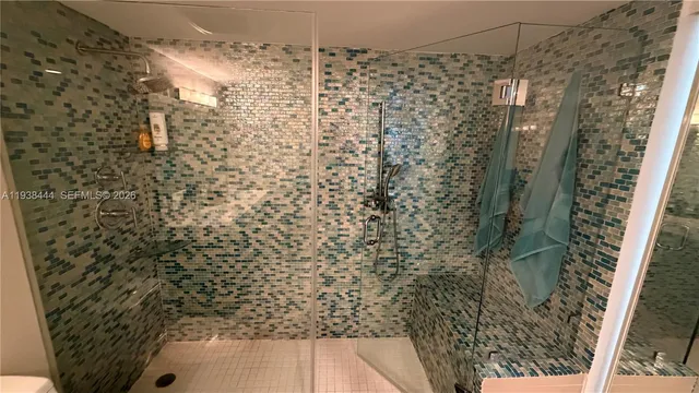 a room with furniture and a flat screen tv