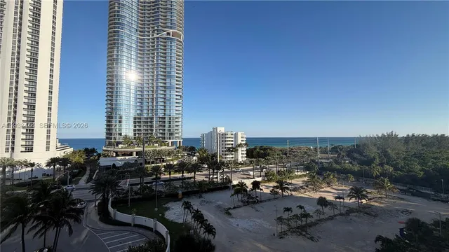 a view of balcony with wooden floor