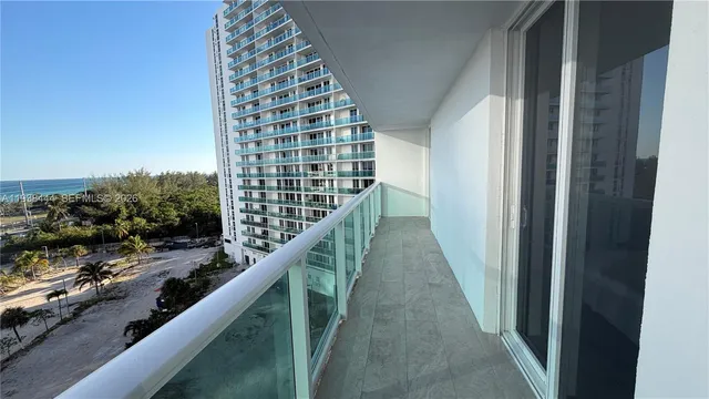 a view of roof with sitting area