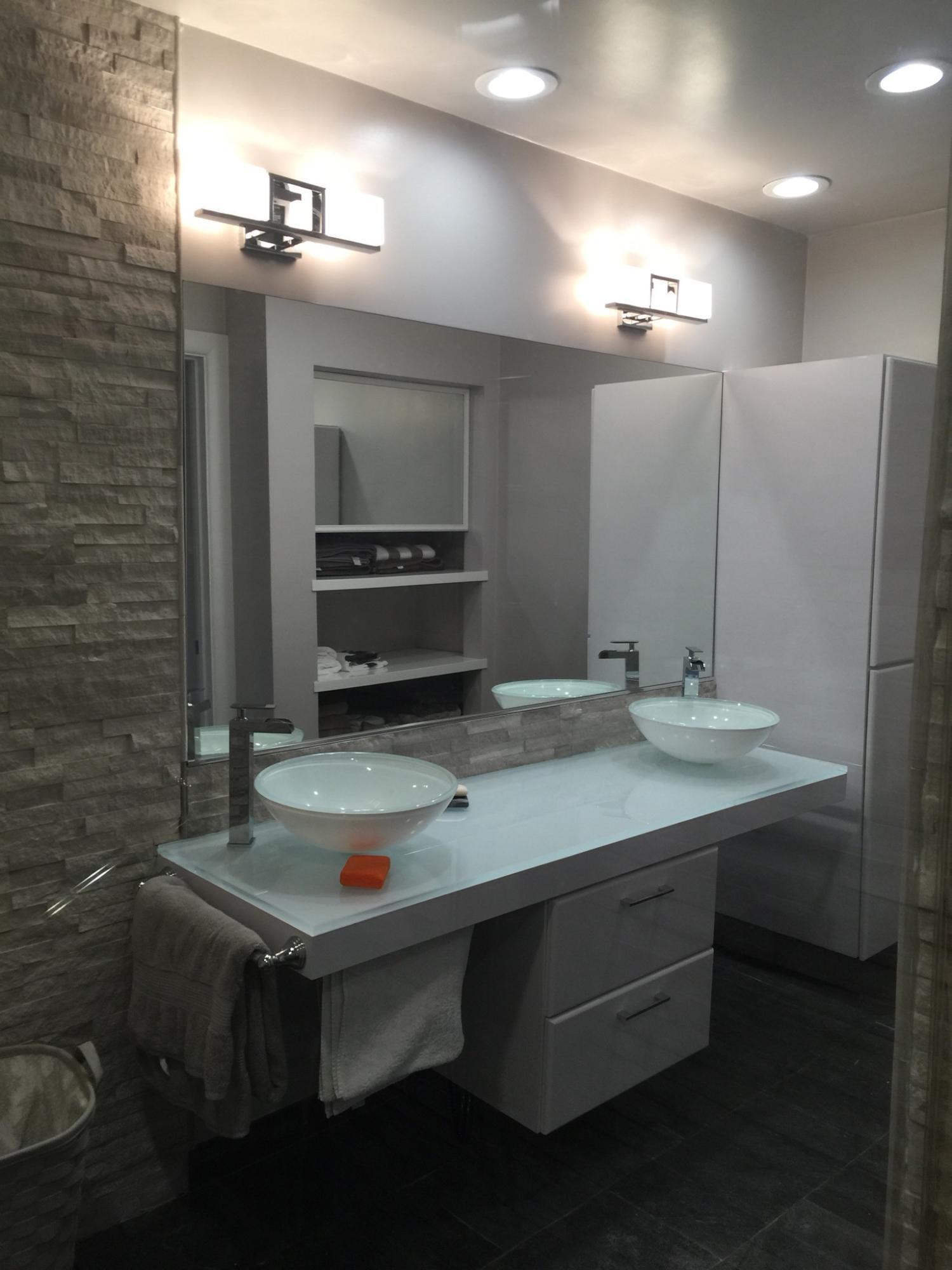 7770 La Mirada Drive Boca Raton, FL 33433 - Photo 13 of 55 a bathroom with a sink a large mirror and a refrigerator