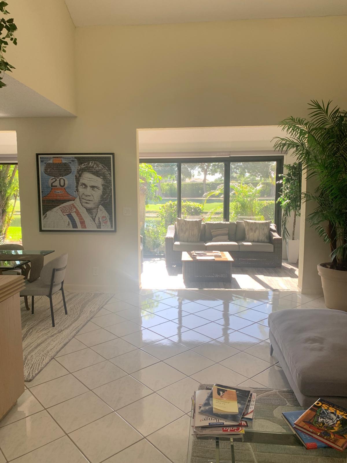 7770 La Mirada Drive Boca Raton, FL 33433 - Photo 28 of 55 a living room with furniture and a large window