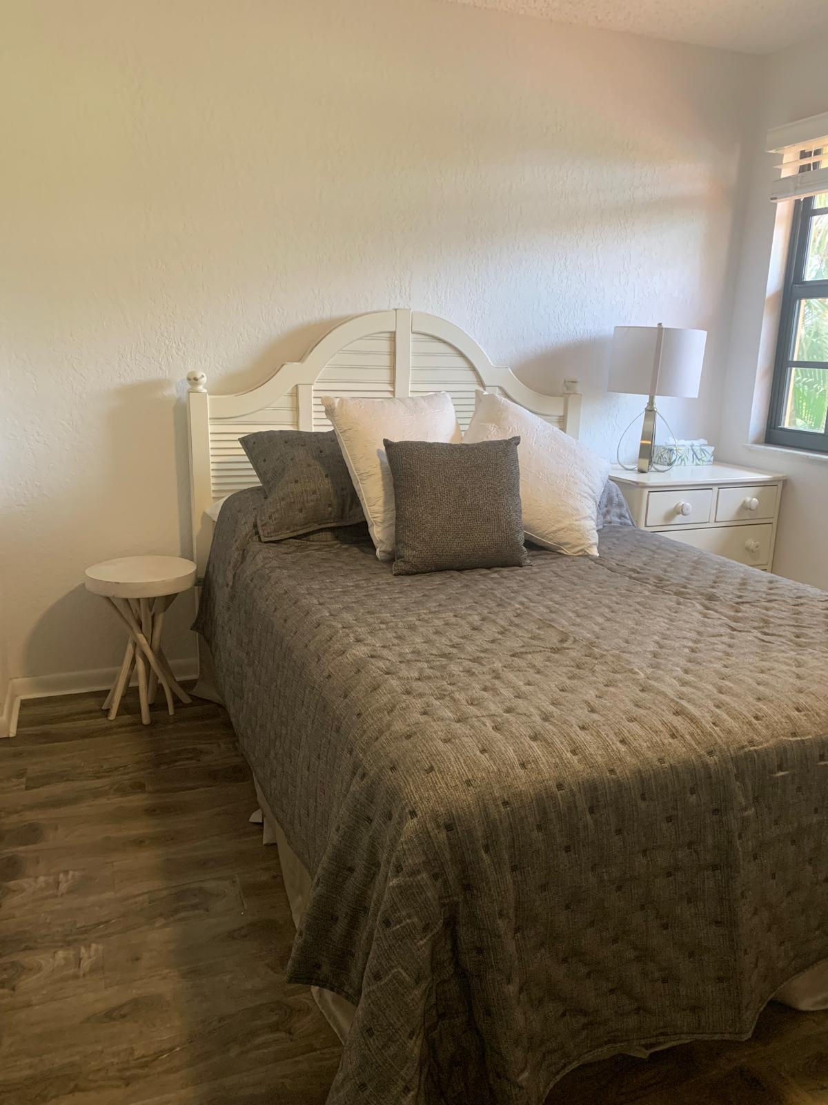 7770 La Mirada Drive Boca Raton, FL 33433 - Photo 34 of 55 a spacious bedroom with a bed and a view of bathroom