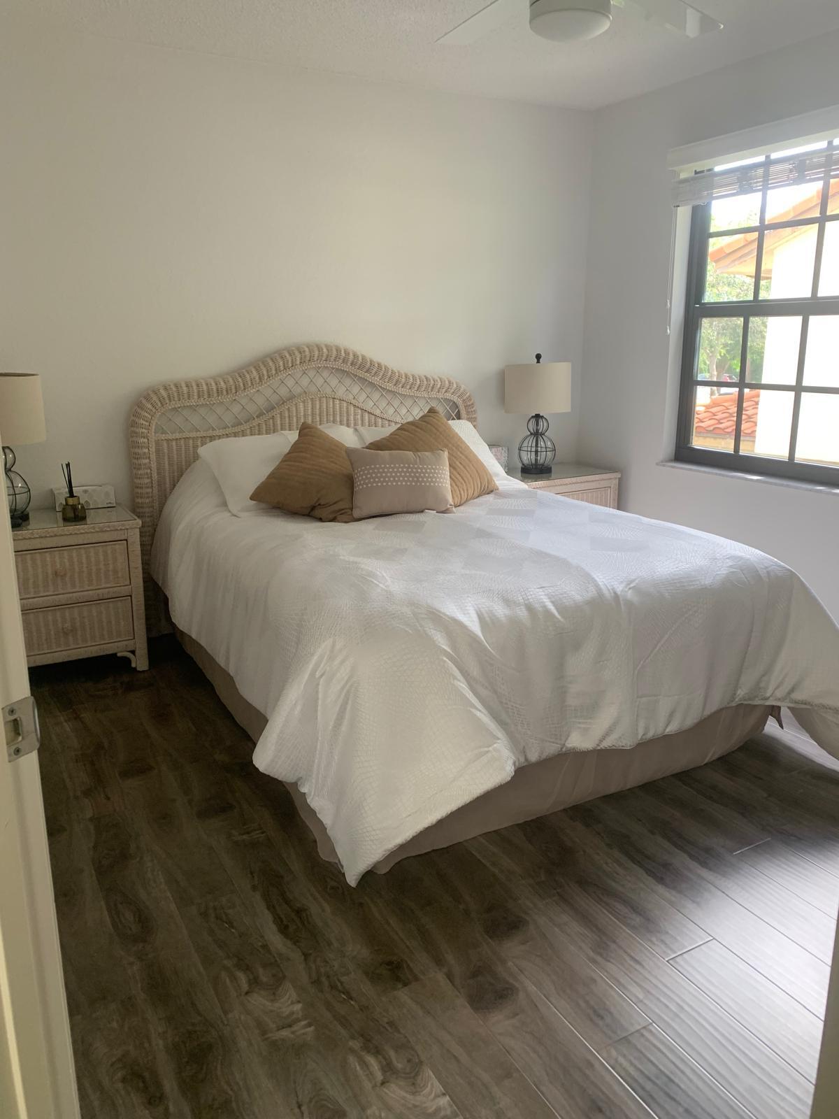 7770 La Mirada Drive Boca Raton, FL 33433 - Photo 36 of 55 a bedroom with a bed and window