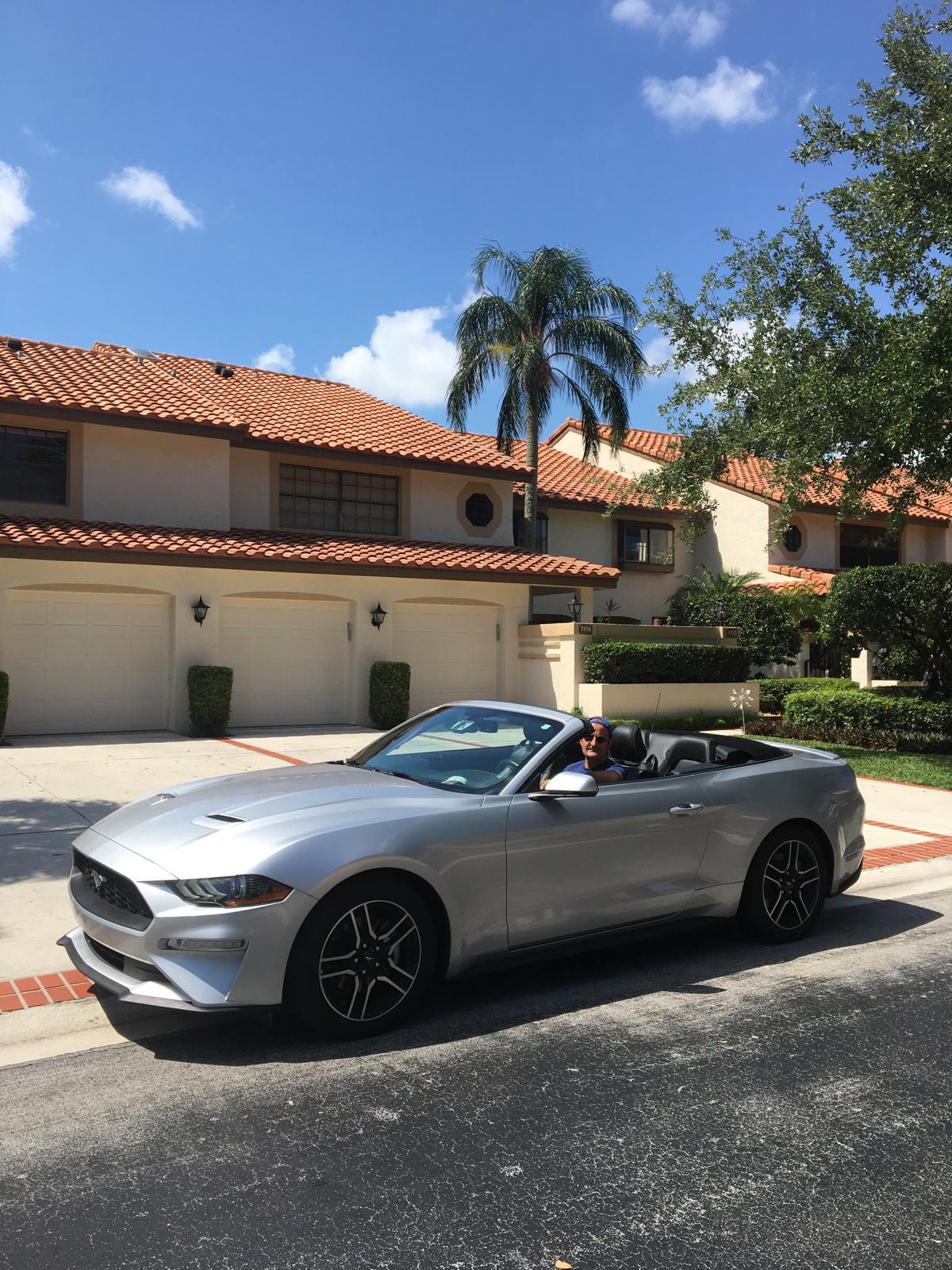 7770 La Mirada Drive Boca Raton, FL 33433 - Photo 39 of 55 a view of a car parked in front of a house
