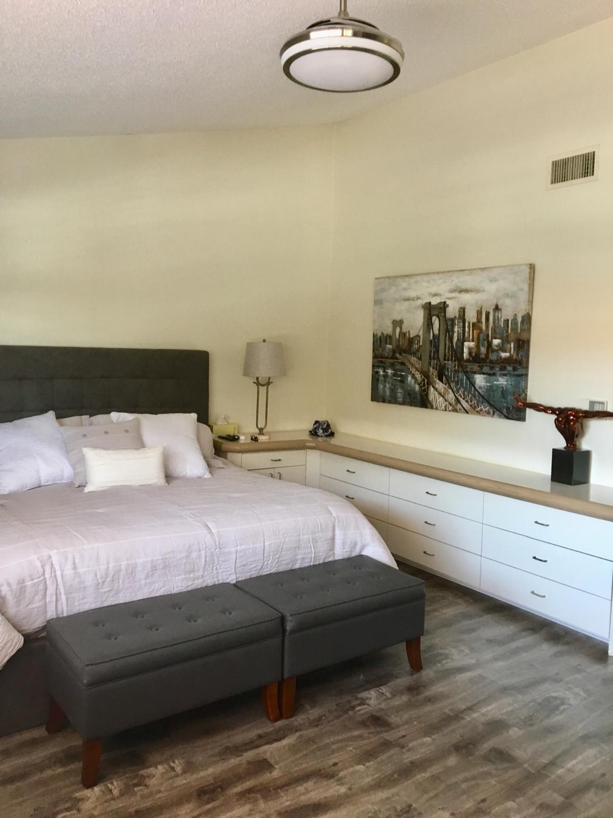 7770 La Mirada Drive Boca Raton, FL 33433 - Photo 42 of 55 a bedroom with a bed and a chandelier