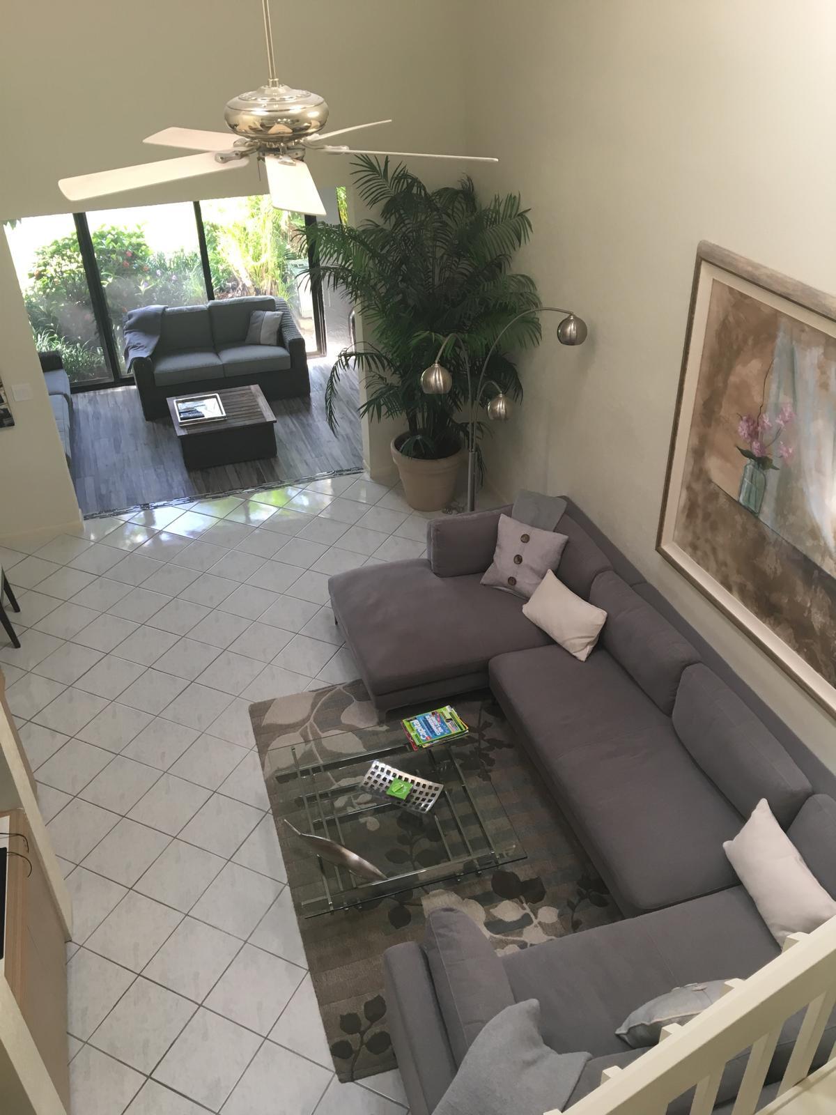 7770 La Mirada Drive Boca Raton, FL 33433 - Photo 47 of 55 a living room with furniture and a fireplace