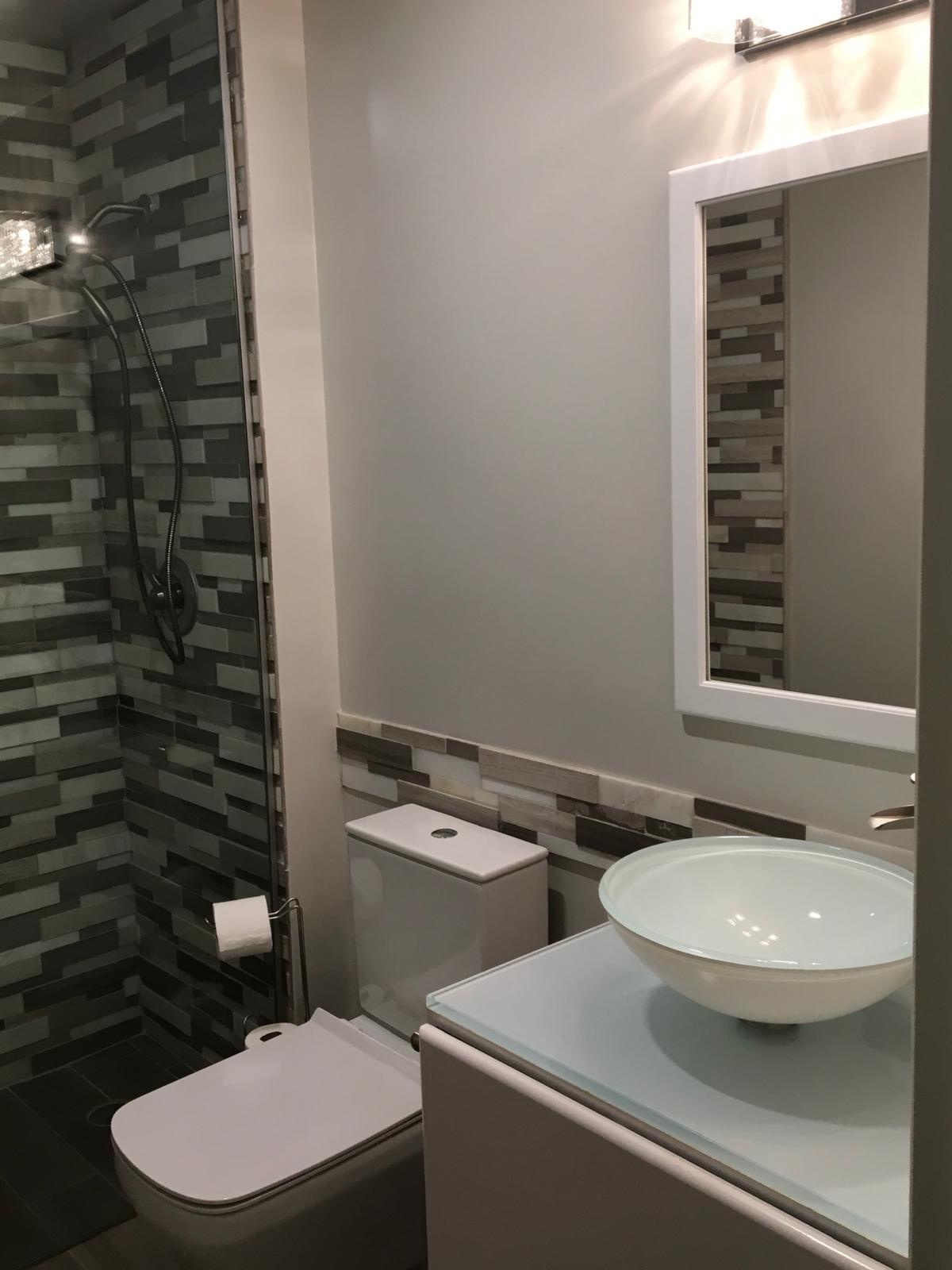 7770 La Mirada Drive Boca Raton, FL 33433 - Photo 48 of 55 a bathroom with a toilet a sink and a window