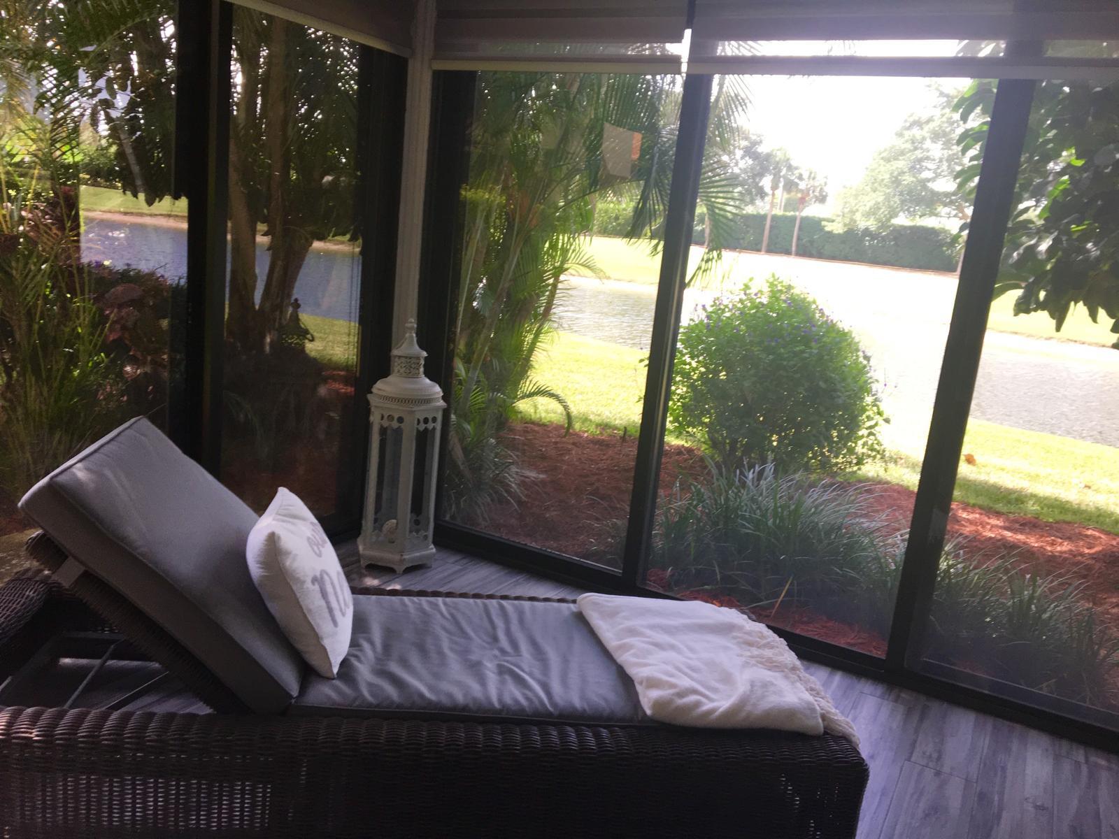7770 La Mirada Drive Boca Raton, FL 33433 - Photo 52 of 55 a bedroom with a bed and a large window