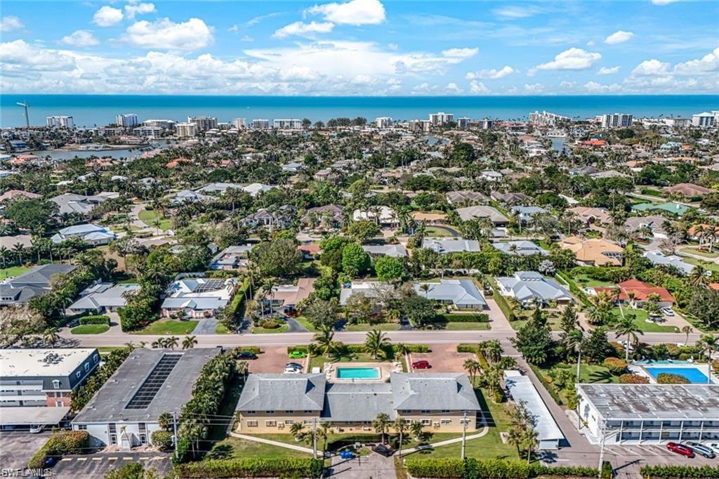 2000 Alamanda Drive, Unit 206 Naples, FL 34102 - Photo 28 of 31 an aerial view of a city