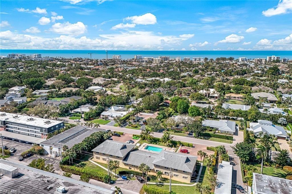 2000 Alamanda Drive, Unit 206 Naples, FL 34102 - Photo 29 of 31 an aerial view of a city