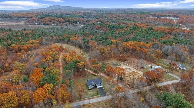 an aerial view of residential house with outdoor space