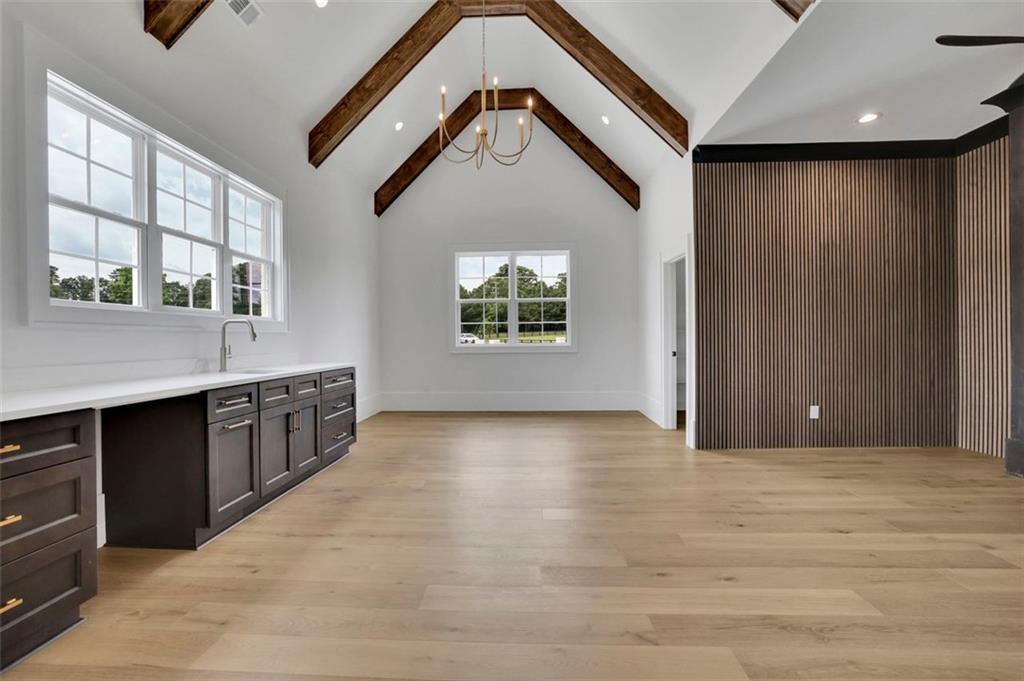 3893 Indian Shoals Road Southeast Bethlehem, GA 30620 - Photo 28 of 63 a view of a kitchen with a sink and dishwasher