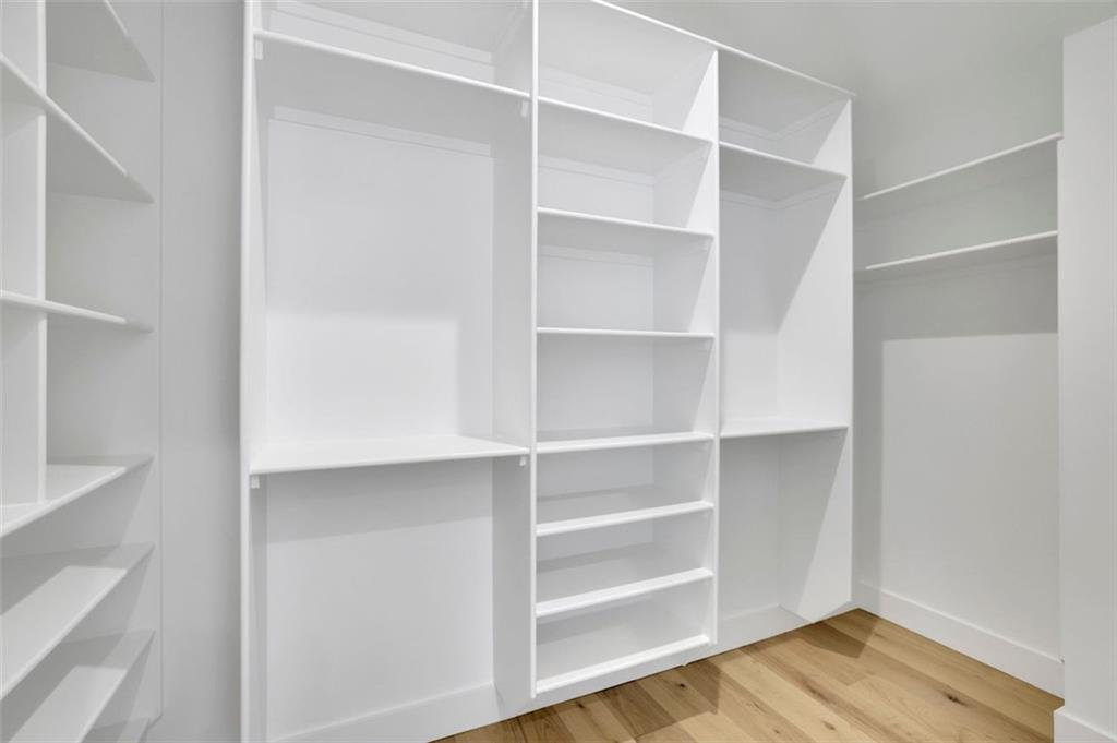 3893 Indian Shoals Road Southeast Bethlehem, GA 30620 - Photo 34 of 63 a view of walk in closet with empty racks
