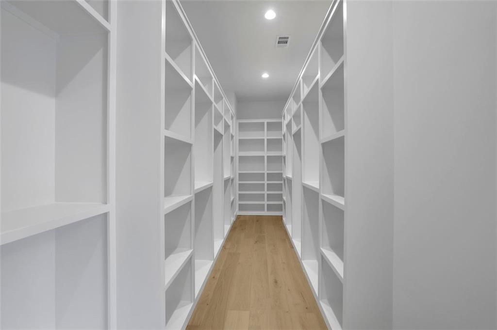 3893 Indian Shoals Road Southeast Bethlehem, GA 30620 - Photo 36 of 63 a view of walk in closet with empty racks