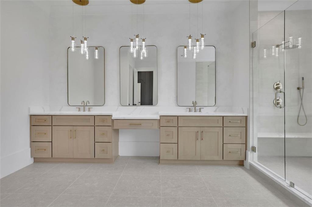 3893 Indian Shoals Road Southeast Bethlehem, GA 30620 - Photo 38 of 63 a bathroom with a double vanity sink mirror and double