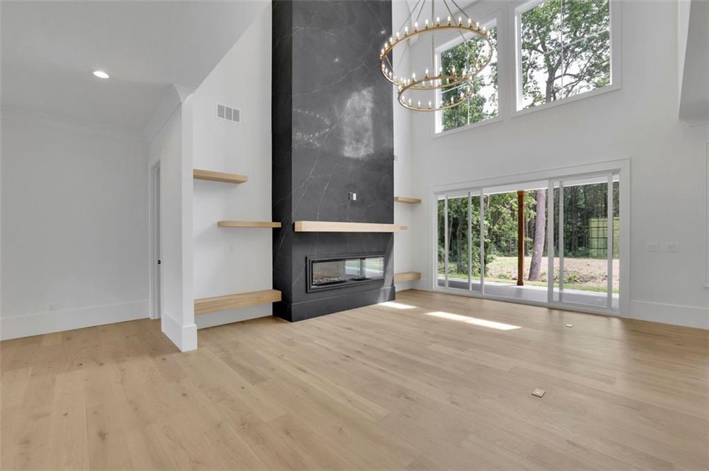 3893 Indian Shoals Road Southeast Bethlehem, GA 30620 - Photo 5 of 63 a view of a livingroom with a fireplace