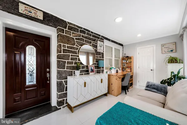 a living room with furniture and window