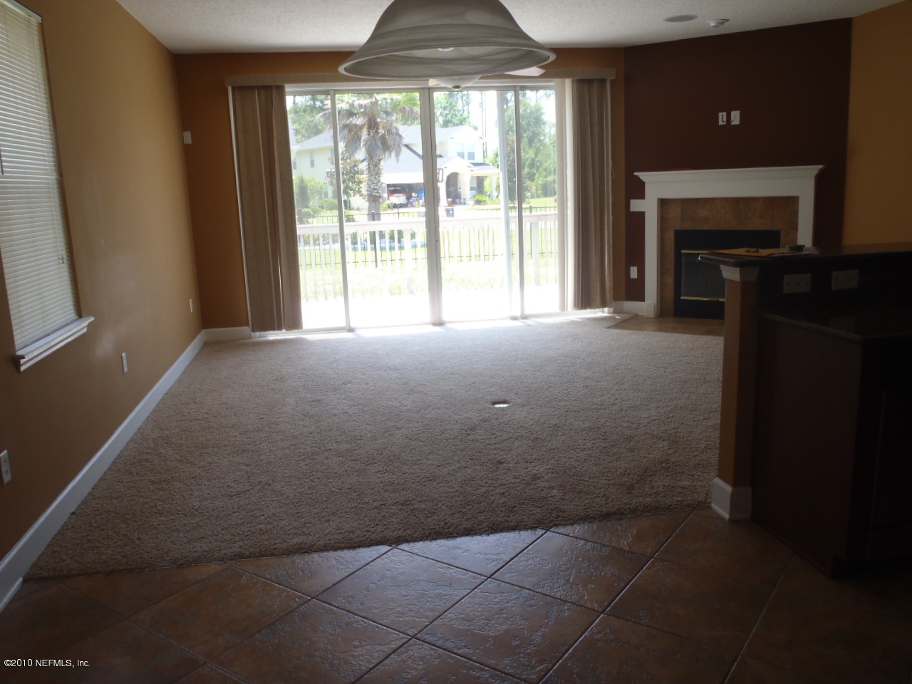 2417 Tall Cedars Road Fleming Island, FL 32003 - Photo 4 of 8 Family room fire place