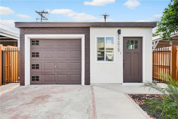 a view of a house with a wooden door