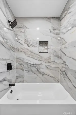 a bathroom with a bathtub