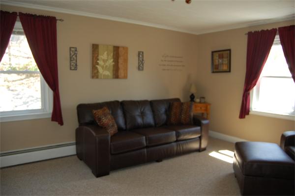 30 Pine Swamp Road Cumberland, RI 02864 - Photo 3 of 11 a living room with furniture and a window