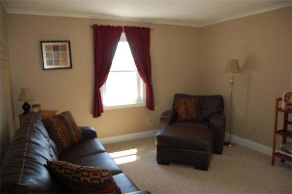 30 Pine Swamp Road Cumberland, RI 02864 - Photo 4 of 11 a living room with furniture and a window
