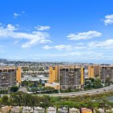 a view of a balcony with city view