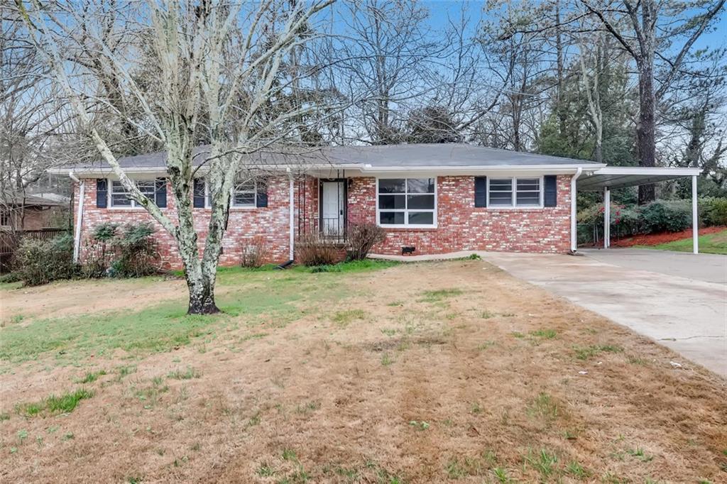 Charming brick ranch with recently replaced HVAC & roof!