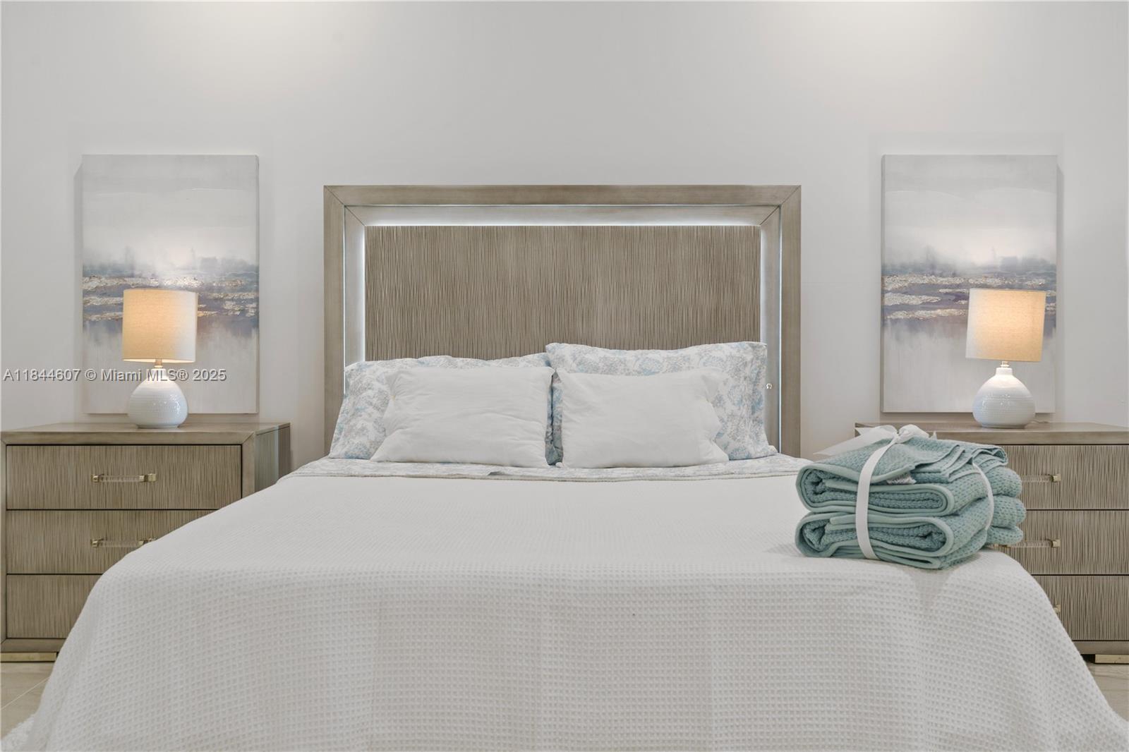 2887 Southwest 33rd Avenue Miami, FL 33133 - Photo 3 of 38 a bedroom with a bed and window