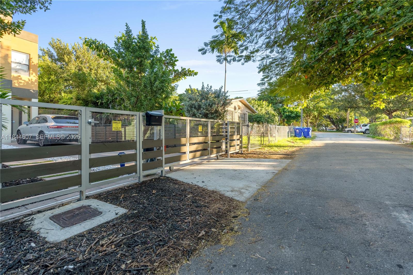 2887 Southwest 33rd Avenue Miami, FL 33133 - Photo 38 of 38 a view of a backyard with wooden fence