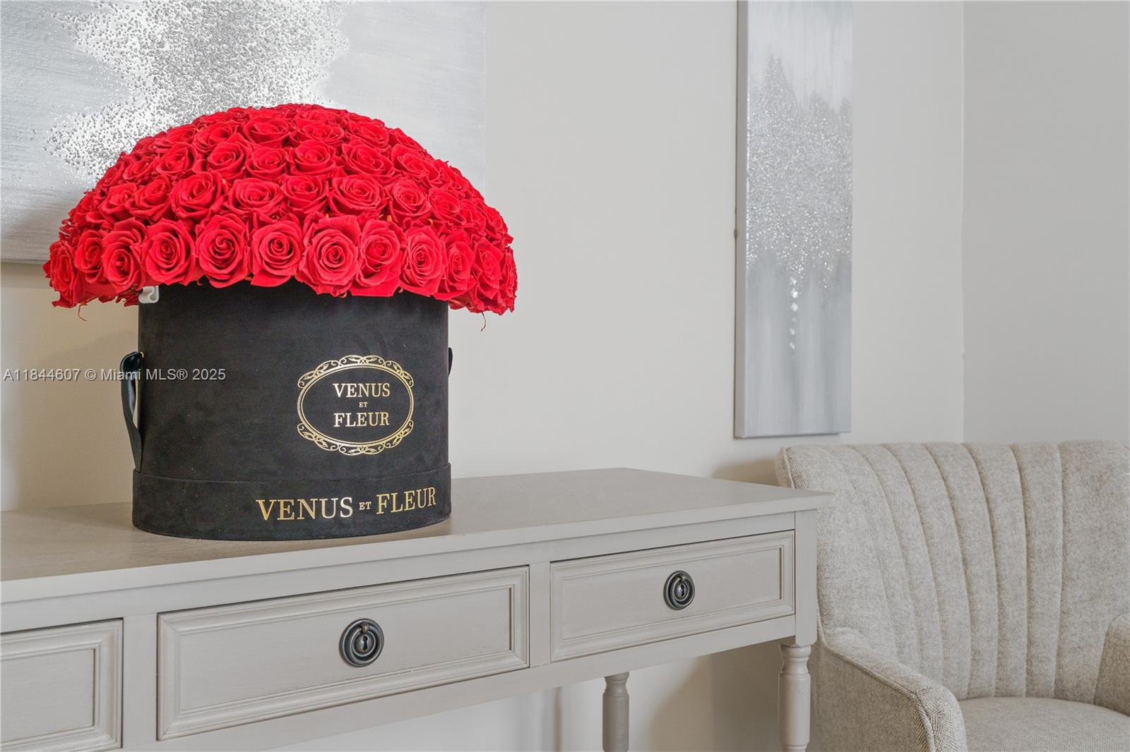 2887 Southwest 33rd Avenue Miami, FL 33133 - Photo 9 of 38 a close view of a sink and a stove with wooden floor