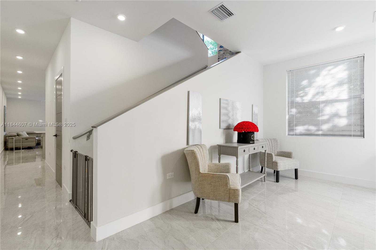2887 Southwest 33rd Avenue Miami, FL 33133 - Photo 10 of 38 a living room with furniture and a window