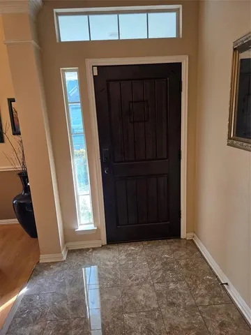 a view of empty room with front door