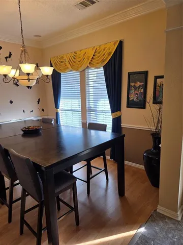 a view of a workspace with furniture