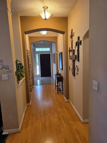 a view of a livingroom with furniture and a fireplace