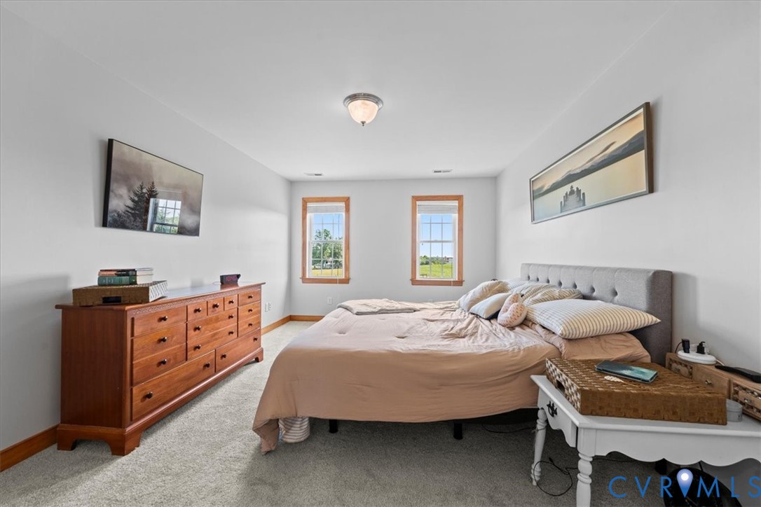 3137 Trenholm Road Powhatan, VA 23139 - Photo 31 of 72 Primary bedroom featuring light gray carpeting and