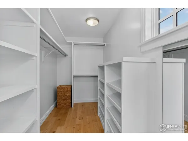 a view of an empty walk in closet