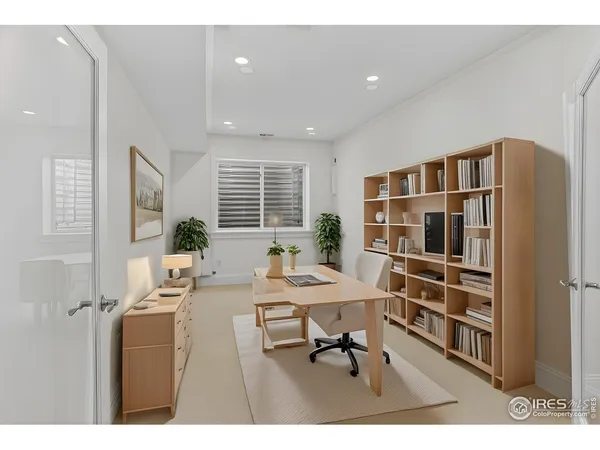 a view of a livingroom with furniture and window